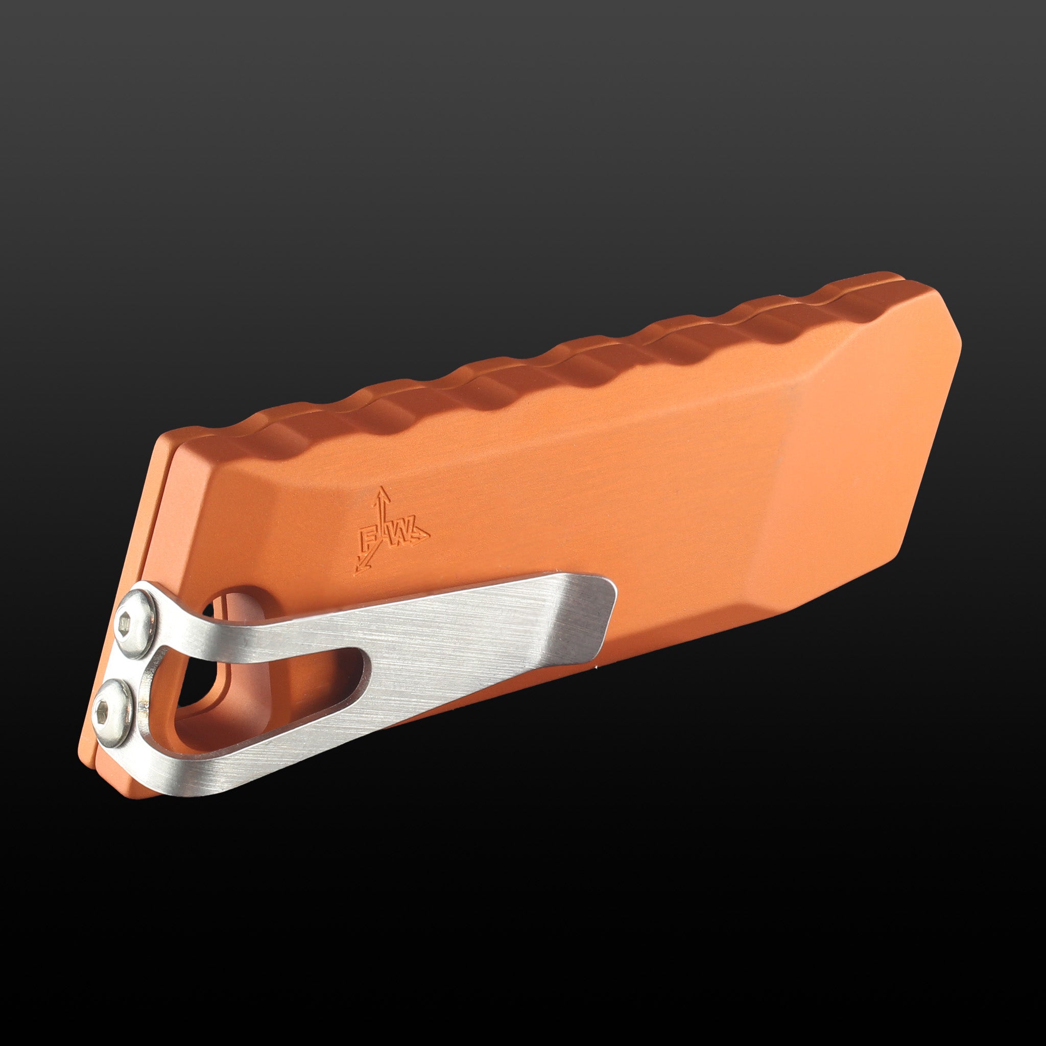 the back of pumpkin orange boxcutter showing the pocket clip