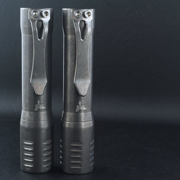 two f2 flashlights in titanium from focusworks edc