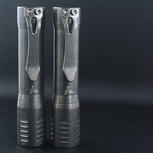 two f2 flashlights in titanium from focusworks edc