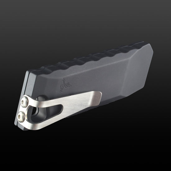 the back of the  black boxcutter showing the pocket clip