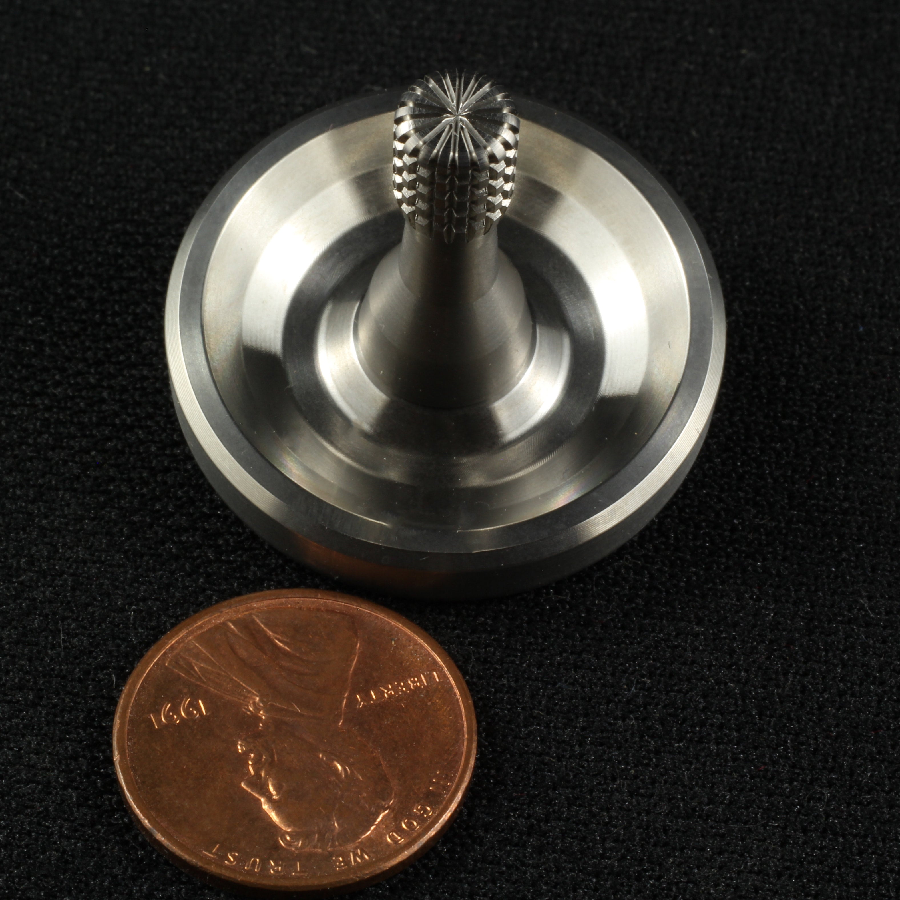 Spinoff stainless steel spinning top