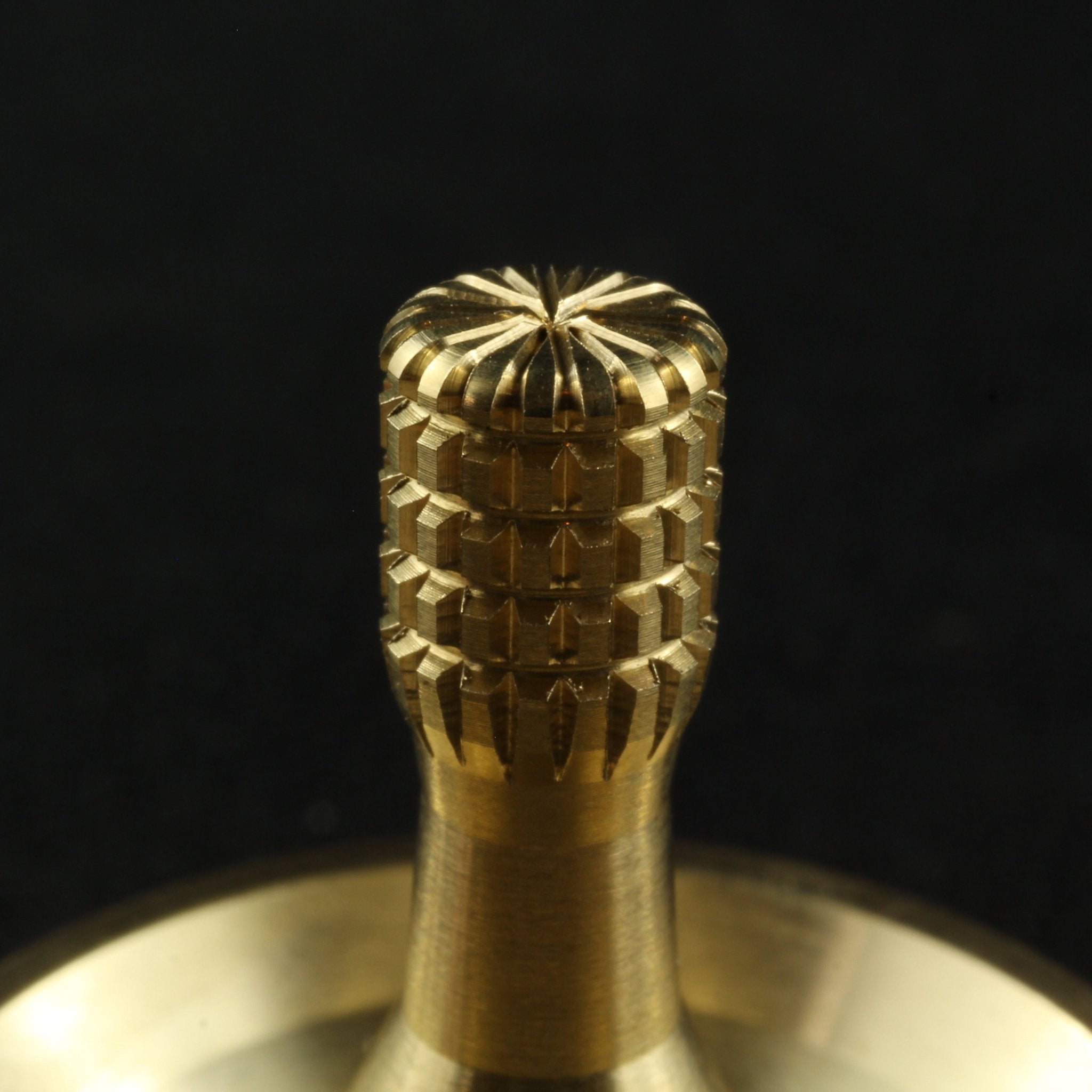 Spinoff Spinning Top in Brass