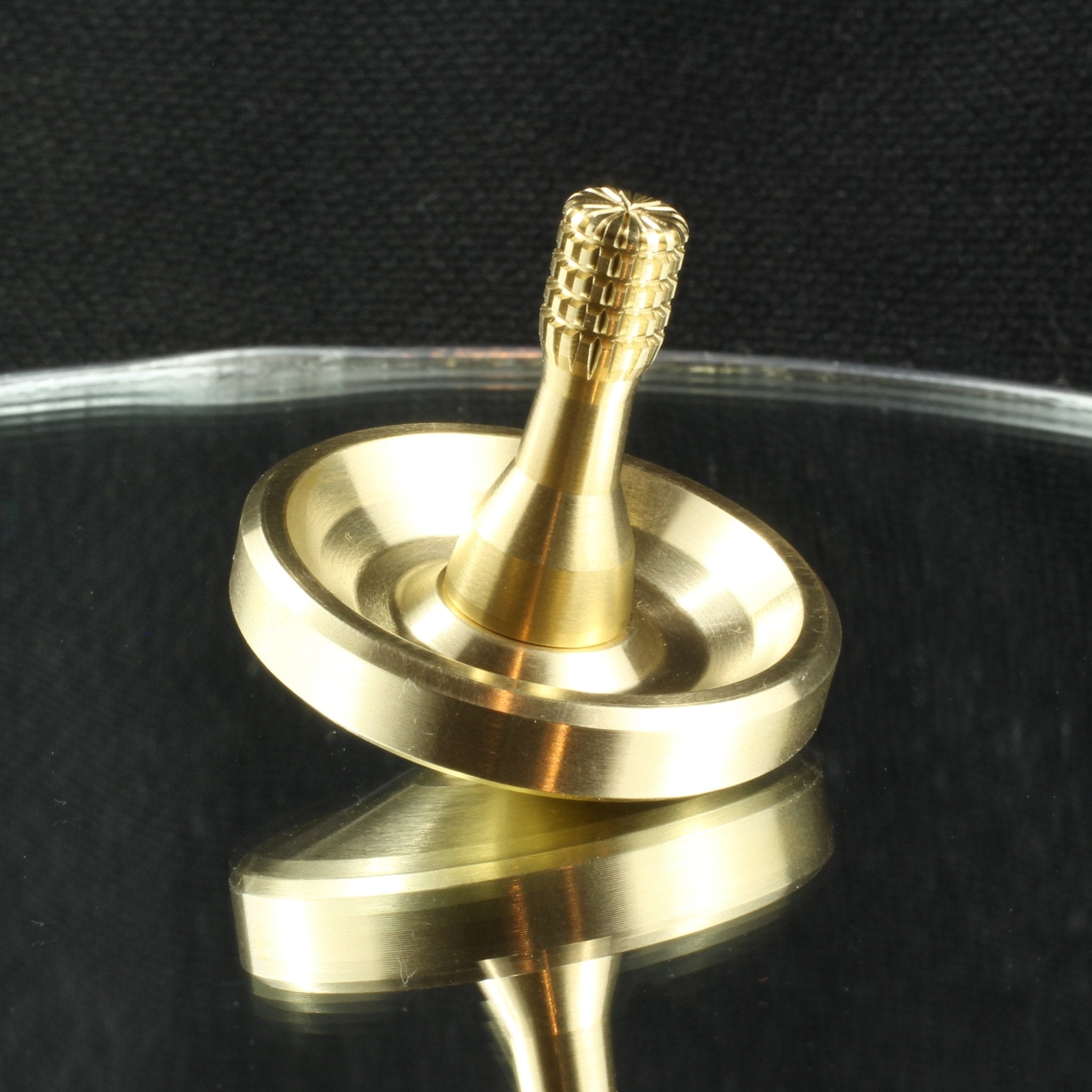Spinoff Spinning Top in Brass