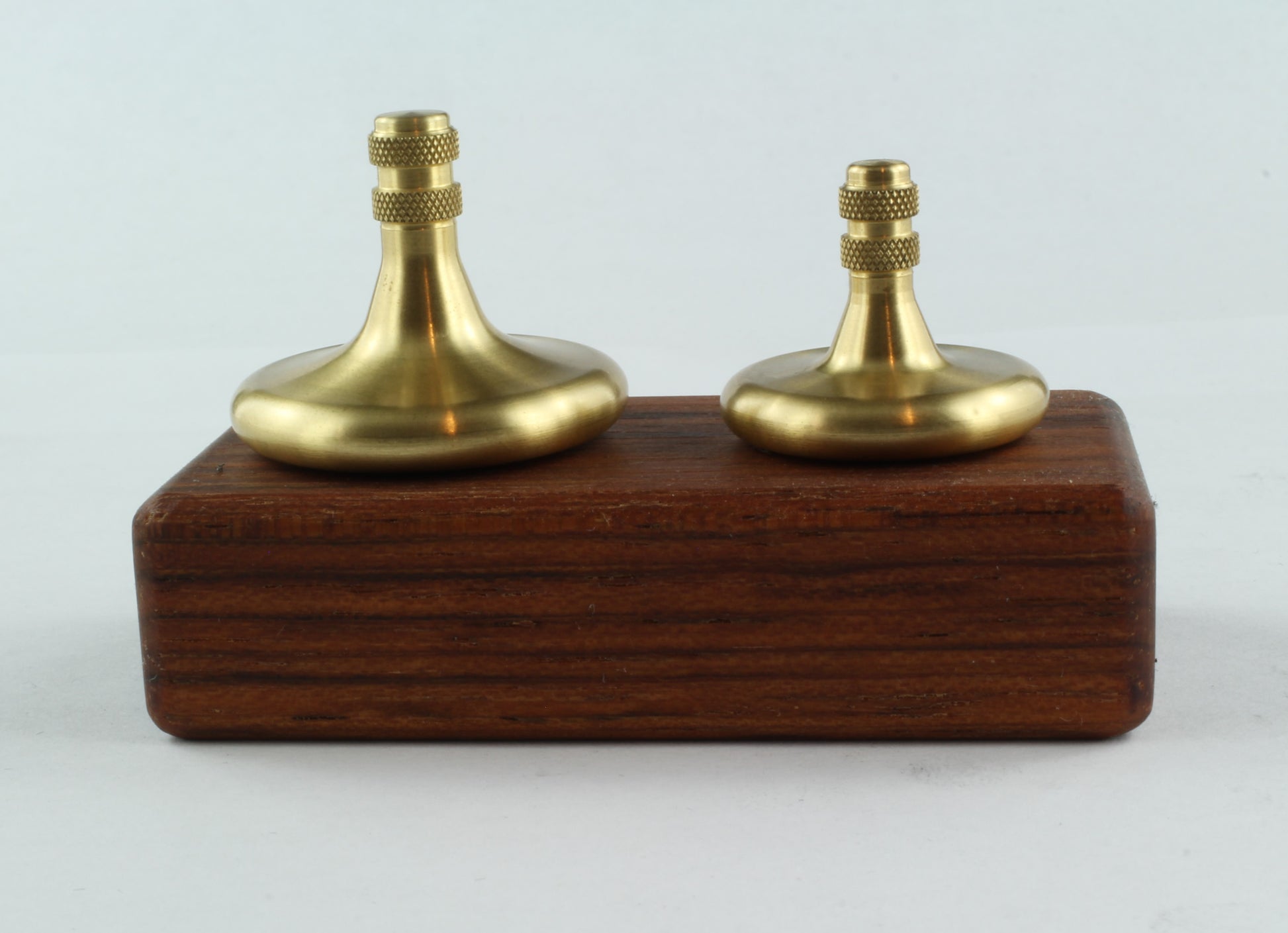 Set of Brass Spinning tops with Jatoba wood stand (Focus 125 and Focus 10)