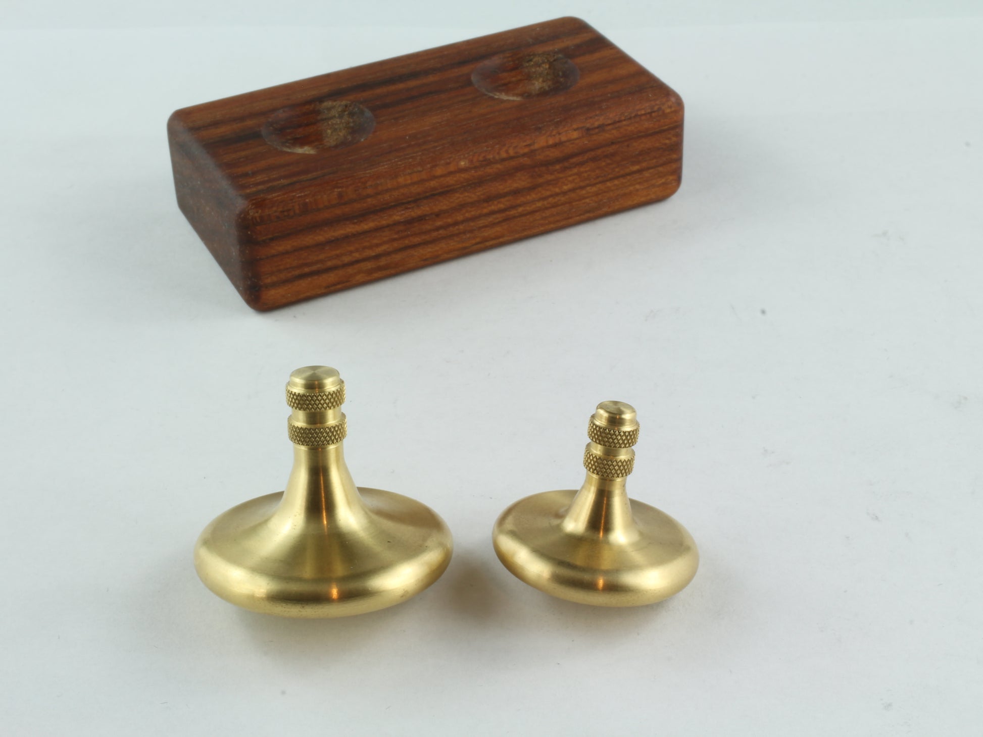 Set of Brass Spinning tops with Jatoba wood stand (Focus 125 and Focus 10)
